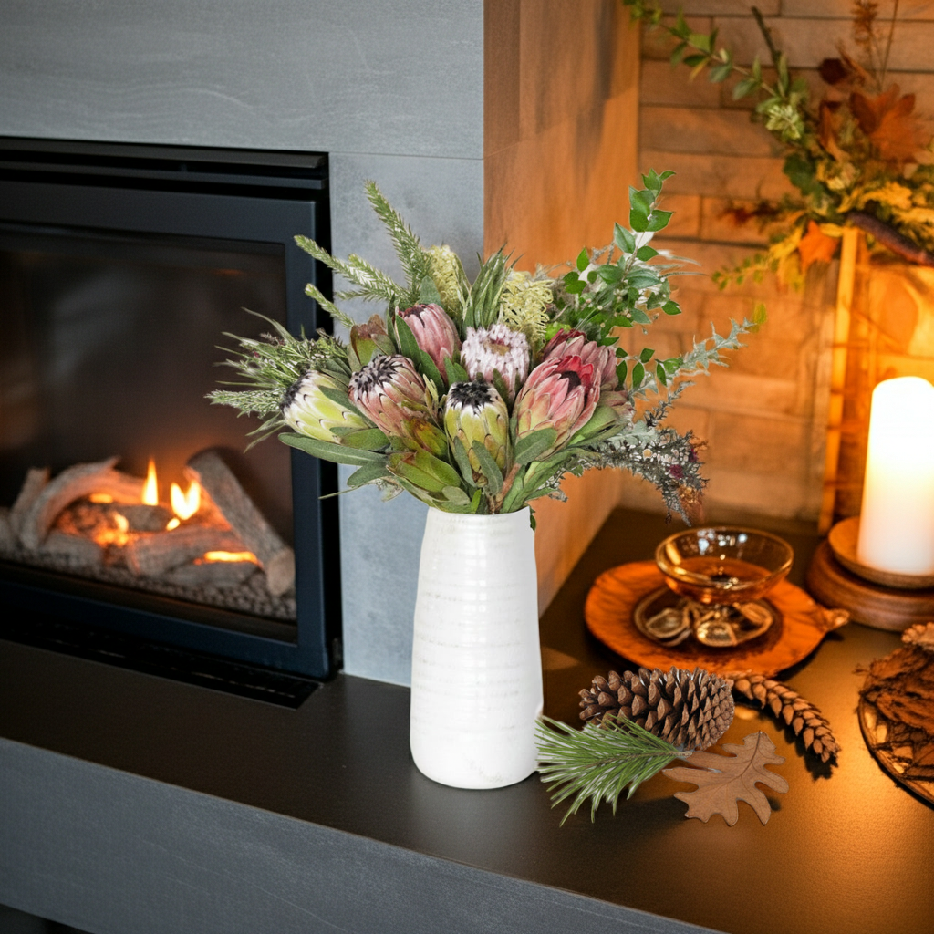 Buy Protea Bouquet - protea arrangement near a fireplace
