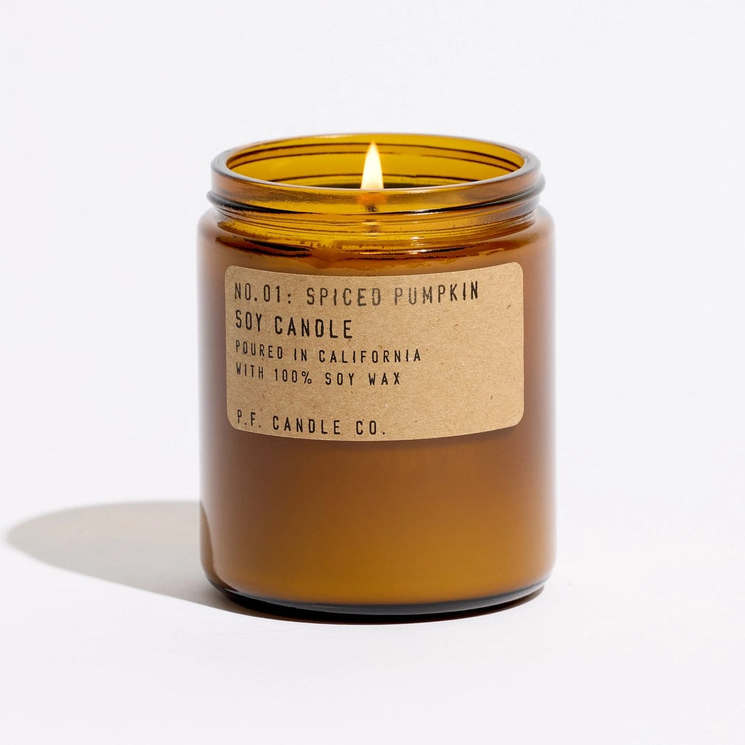 Pumpkin spice candle in an amber jar